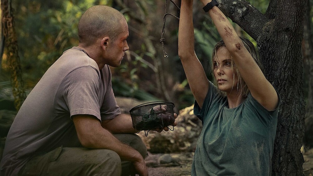 O Jogo do Predador tem no elenco Taron Egerton e Charlize Theron — Foto: Divulgação/Netflix