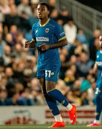 Jamaican international Dujuan ‘Whisper’ Richards during his debut for AFC Wimbledon in the English League One.