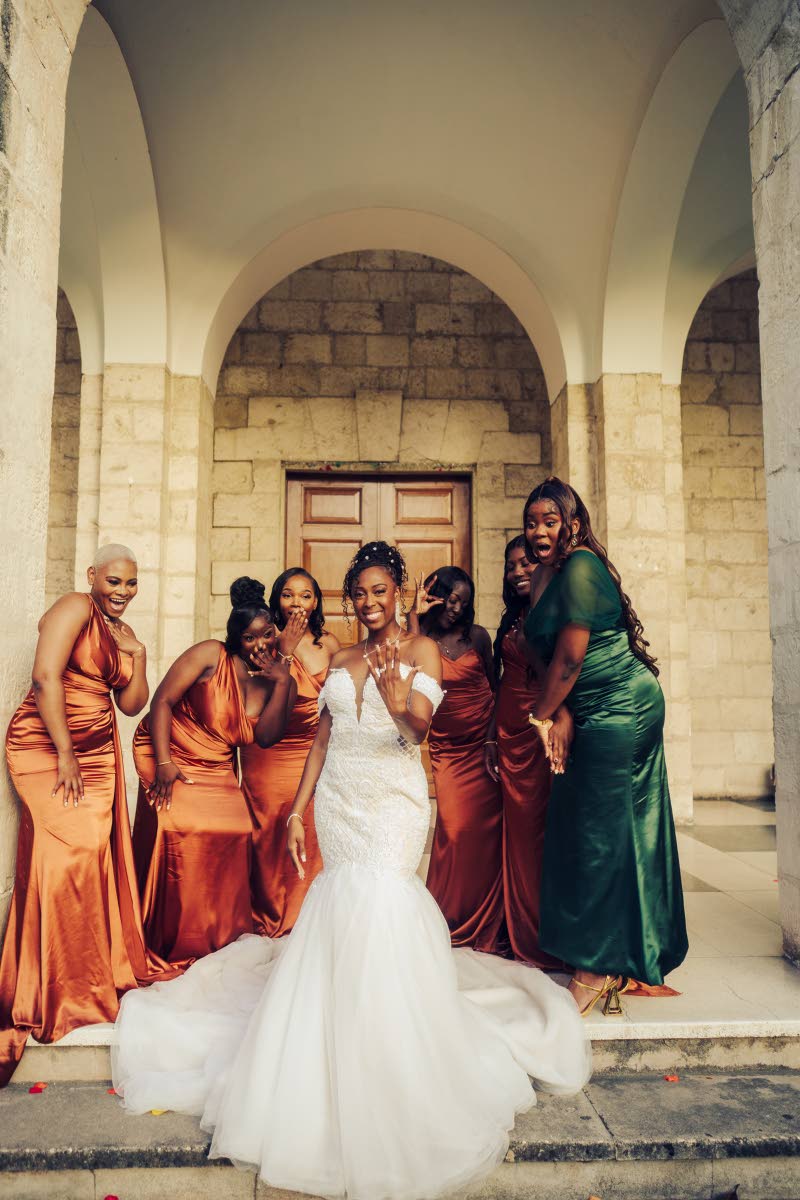 A picture of bridal-party perfection, Deneal (centre) poses with bridesmaids Rene Thomas, Tanique Frazer, Sandrene Walters, Jeanliet Dougherty and Nadre Bell, and maid of honour Denesha Osbourne.