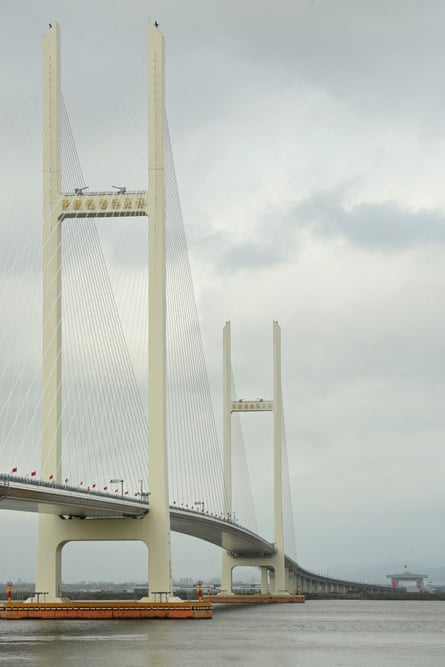 The New Yalu River Bridge’s cable-stayed towers span the river linking China and North Korea